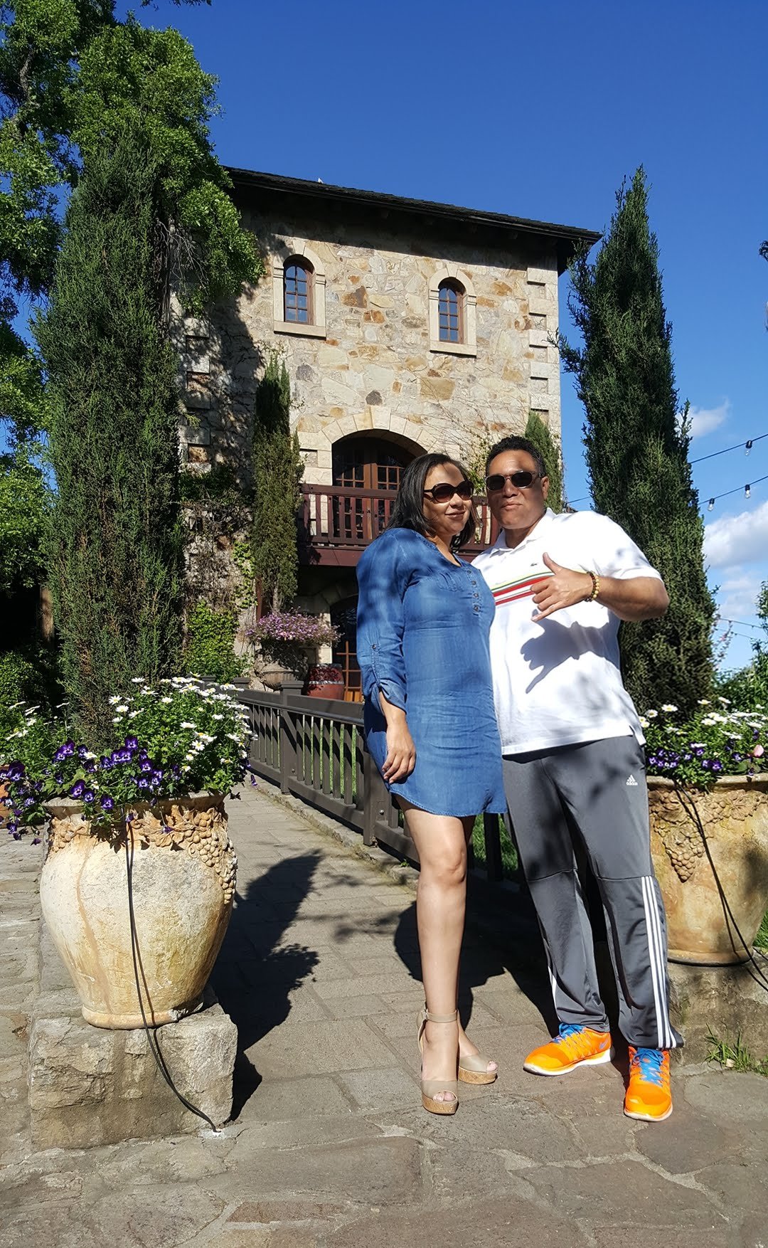 Nick and Audra outside a stone winery